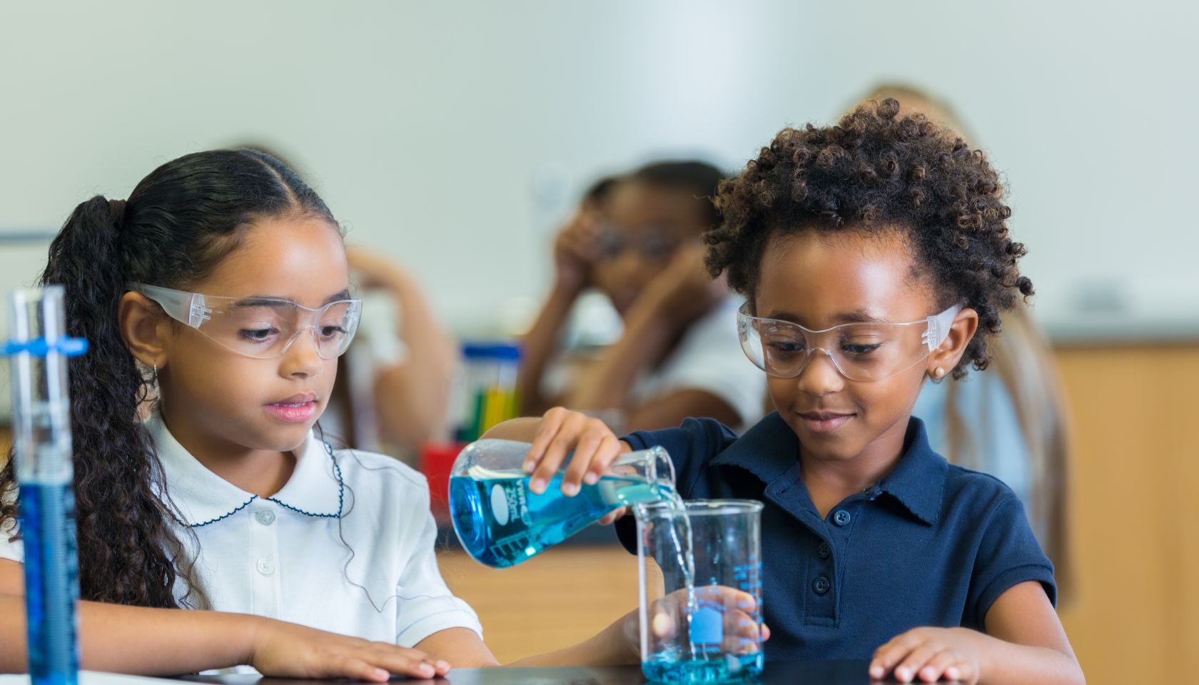 African American STEM school students in science class