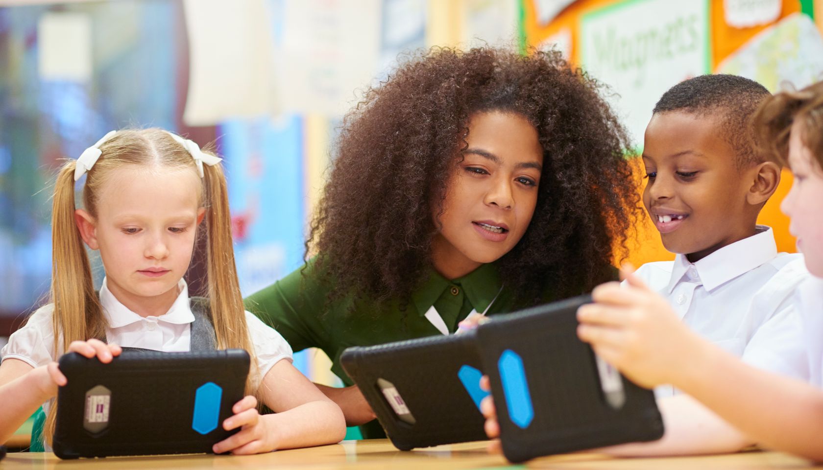 teacher and students learning digitally