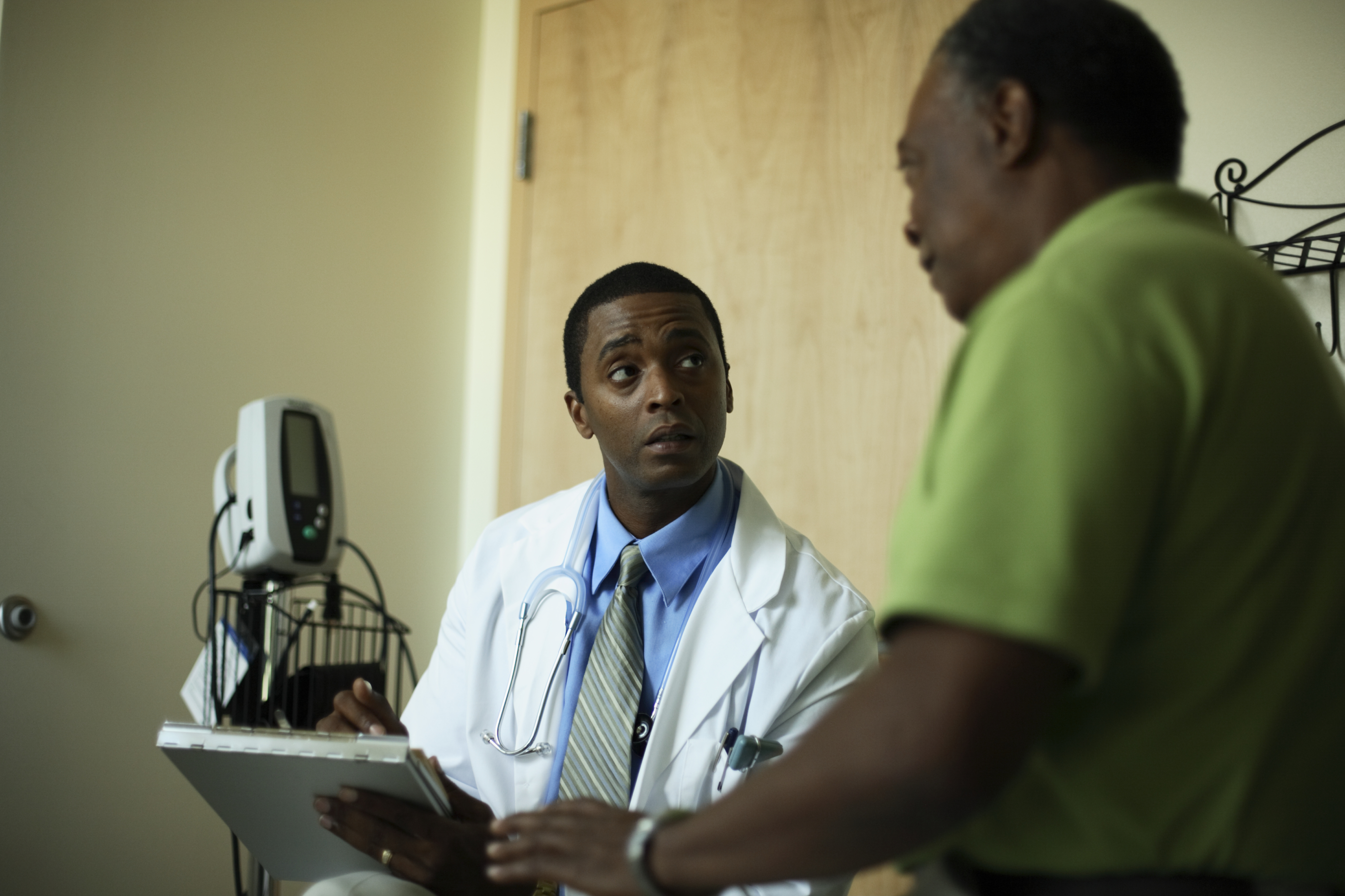 Doctor Listening to Patient