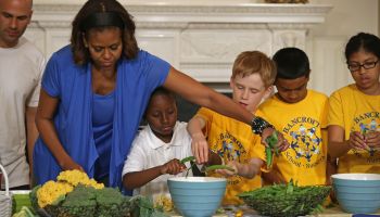 Michelle Obama And Local Students Harvest Crops From White House Kitchen Garden
