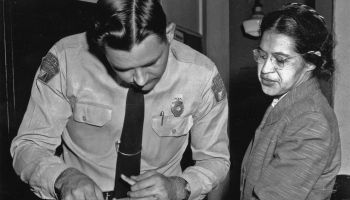 Rosa Parks is fingerprinted by police Lt. D.H. Lackey in Montgomery.