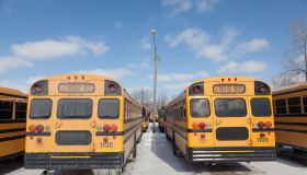 American yellow style school buses in winter