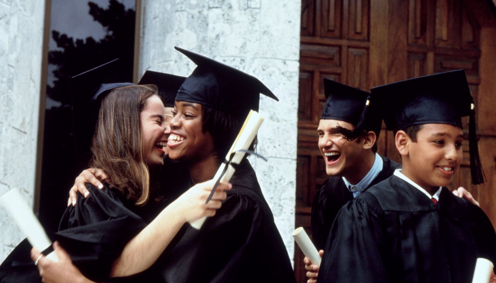 Graduates celebrating after commencement