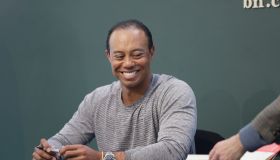 Tiger Woods Signs Copies Of His New Book 'The 1997 Masters: My Story'