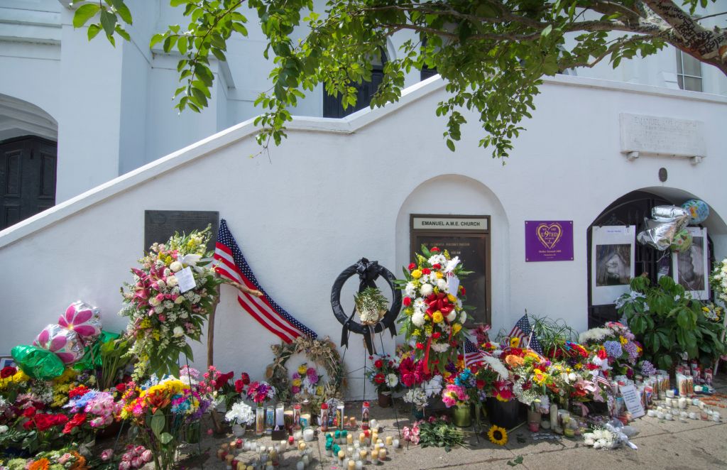 Famous Emanuel A.M.E. Church in Charleston South Carolina flowers and messages and signs left after murder of 9 people