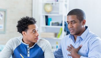 Vulnerable father talks seriously with son