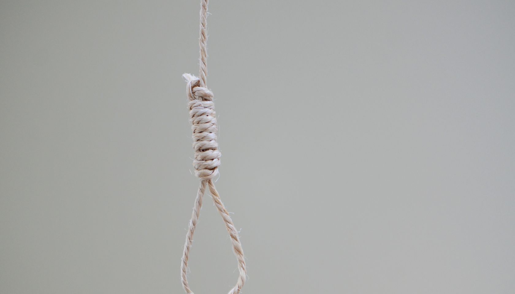 Hanging Noose Rope Against White Background
