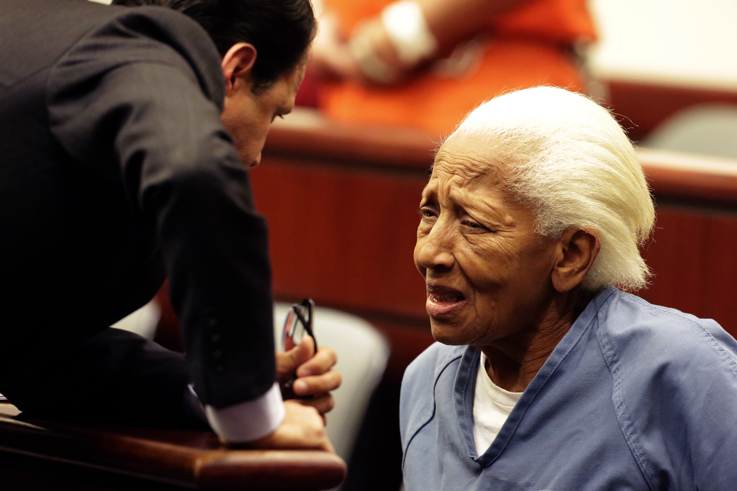 Doris Marie Payne, 83, right, talks her attorneys Gretchen Christina von Helms and Guadalupe Valenc