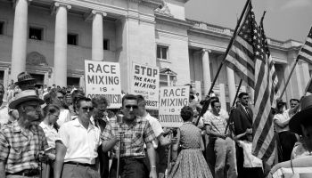 White segregationist demonstrators protesting at the admission of the Little Rock Nine, to Central High School, 1959. The Little Rock Nine were a group of nine African American students enrolled in Little Rock Central High School in 1957. Their enrol