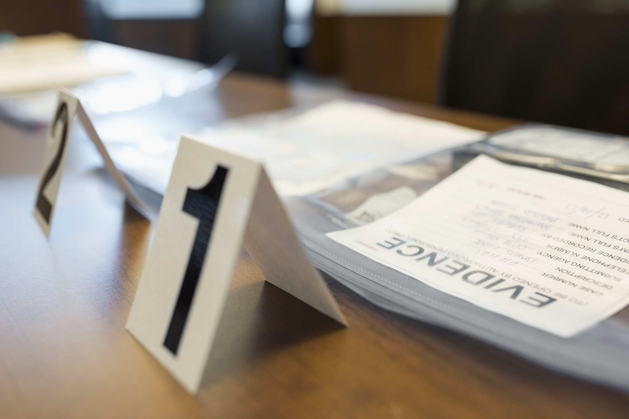 Evidence bags and number tags in courtroom