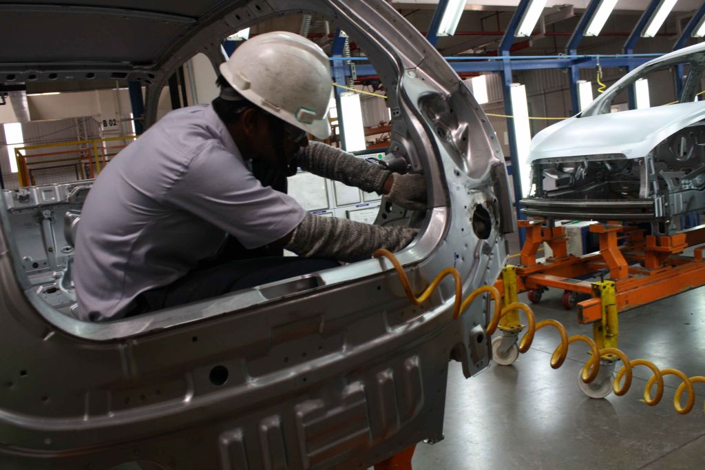 Autoworkers at General Motors India