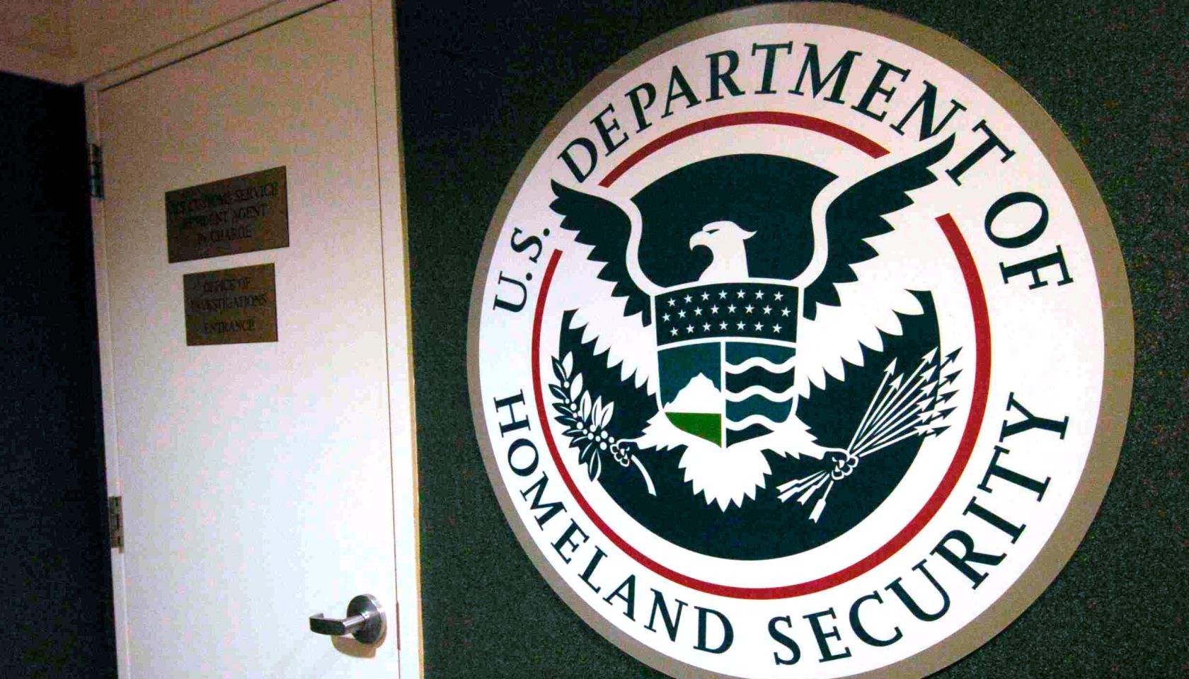 BLAINE, WASHINGTON-Feb. 28, 2005-The sign next to the door for the U.S. Department of Homeland Security, U.S. Immigration and Customs Enforcement, in Blaine, Washington, a border town. (THE DENVER POST PHOTO BY LYN ALWEIS)