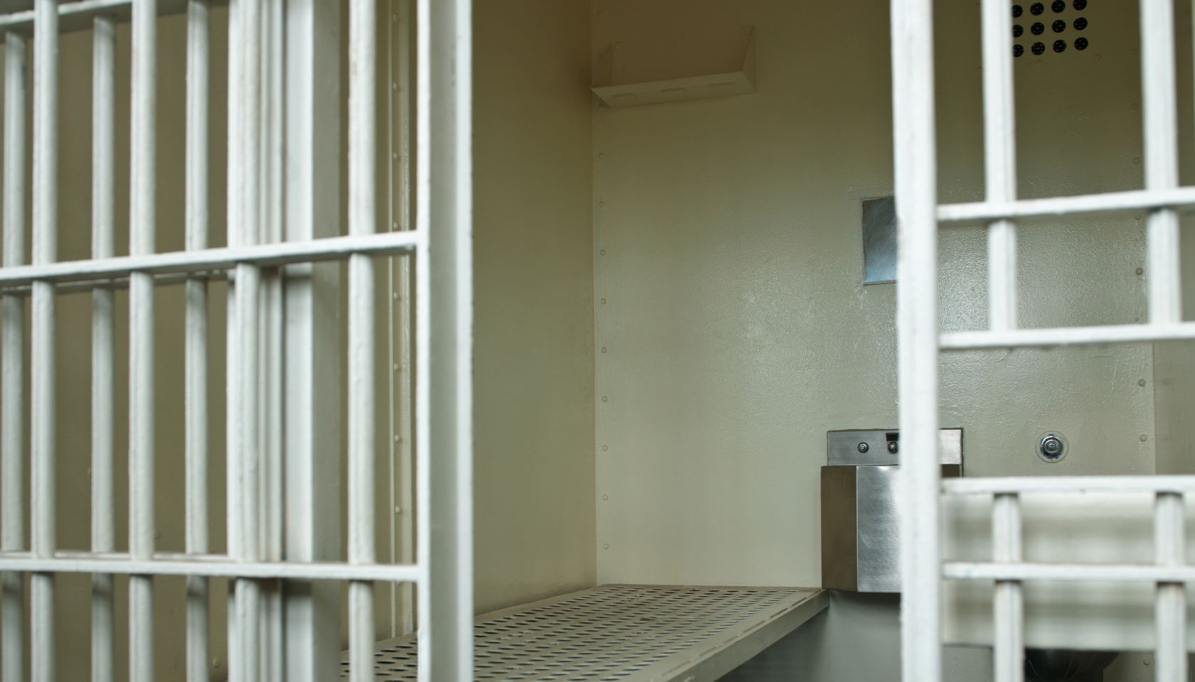Open door to prison cell