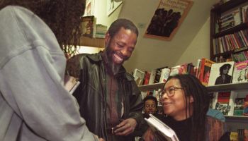 Author Alice Walker (seated with glasses) signs books at Eso Won Books in Inglewood. Walker's new bo