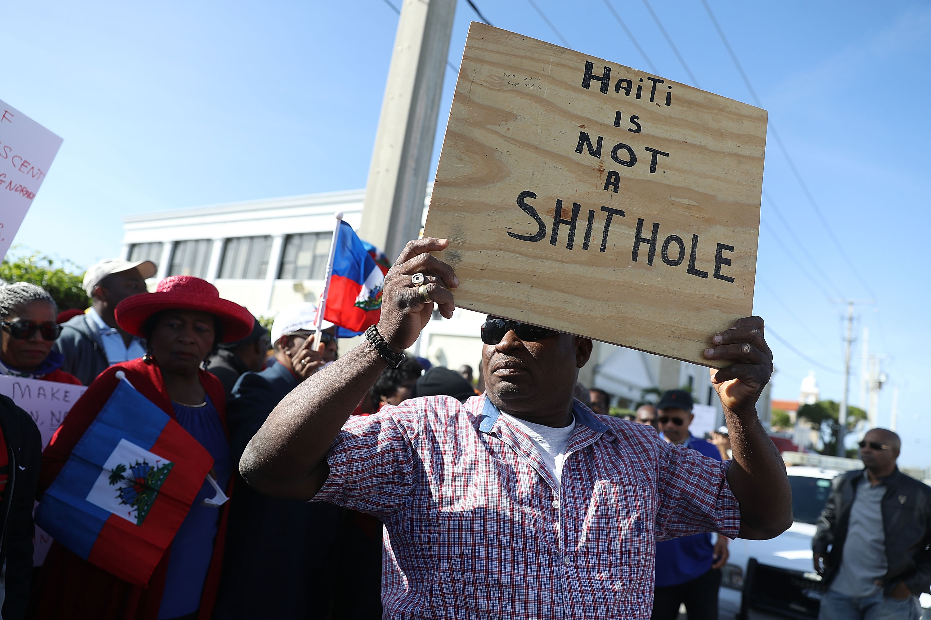Haitian Community Activists Protest President Trump's Recent Offensive Comments Near Mar-a-Lago