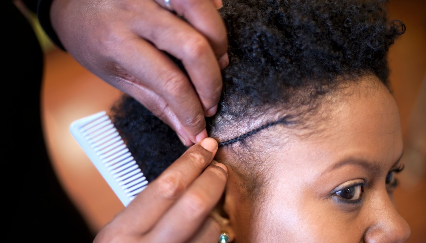 Woman Getting Hair Styled at Salon