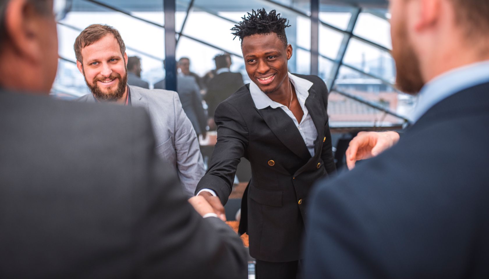 Businessmen shaking hands after meeting