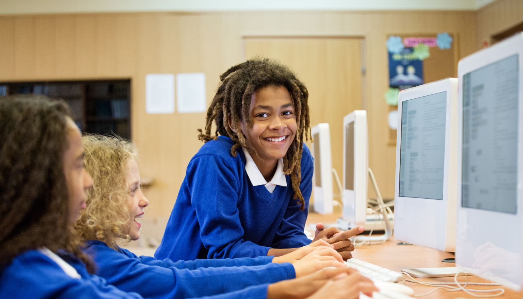 Students learning computer programming
