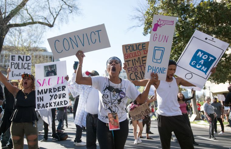 Activists Crowd The Block