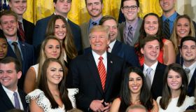 Trump Poses With Outgoing Interns