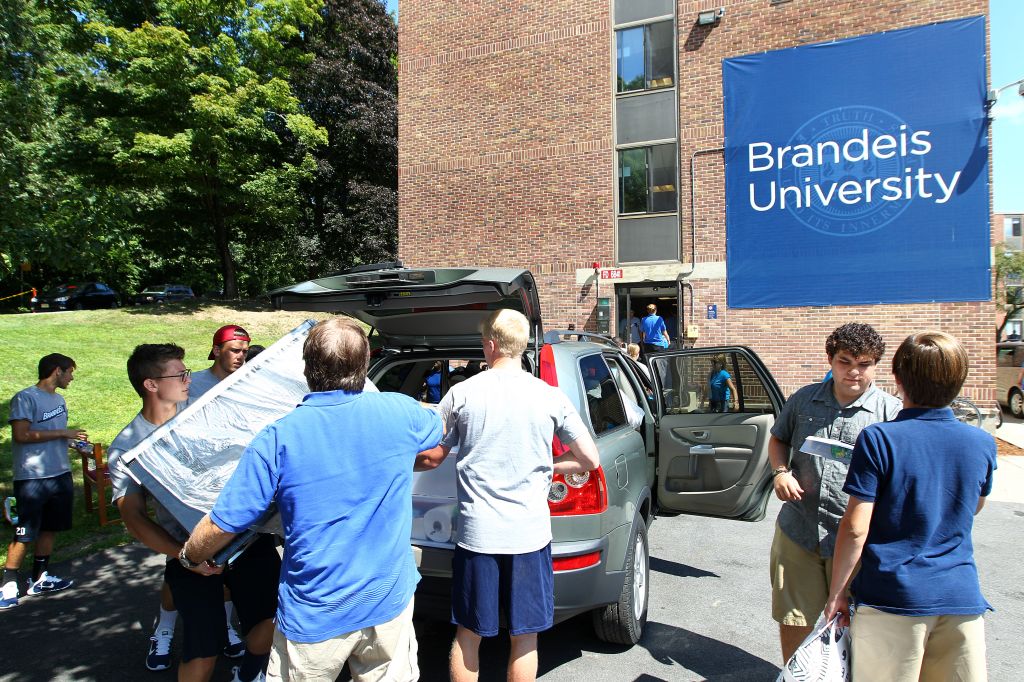 Brandeis Leads Rush Of College Students Back To Campus