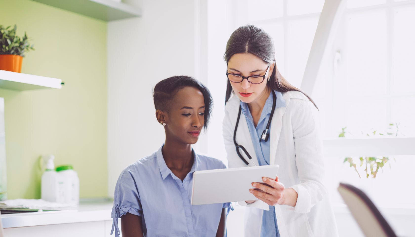 Doctor consulting her patient