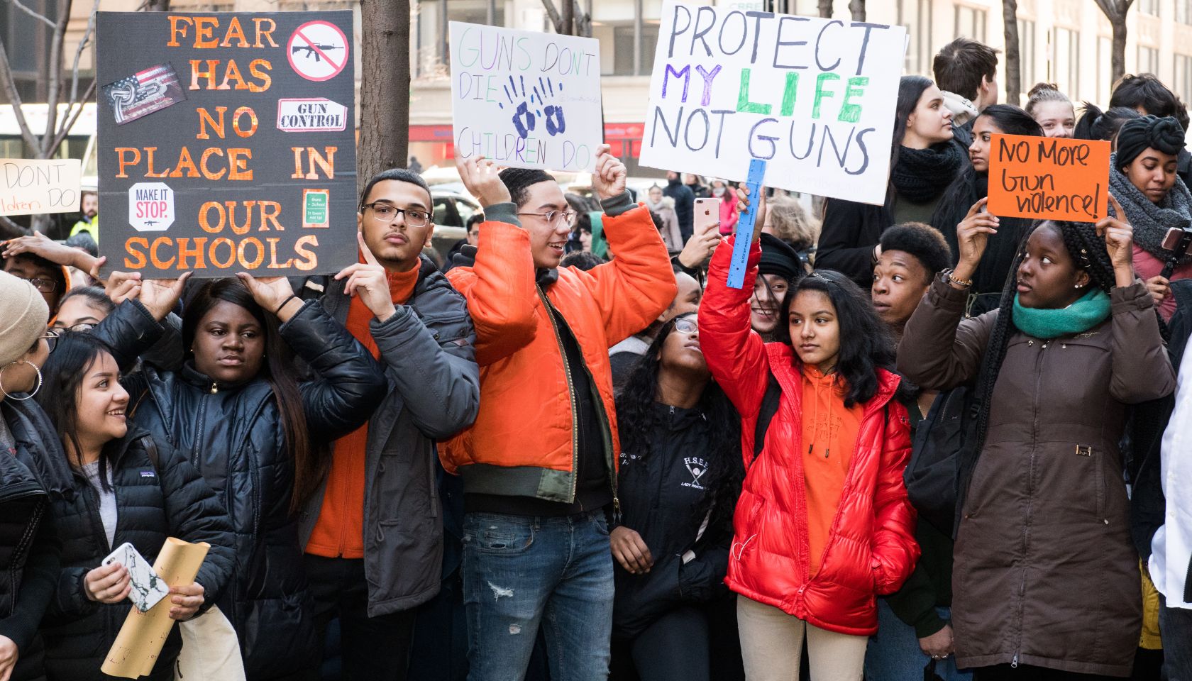 Local students seen holding placards during the National...