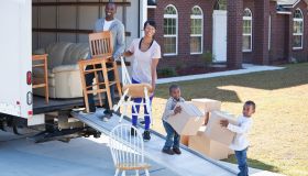 African American family moving house