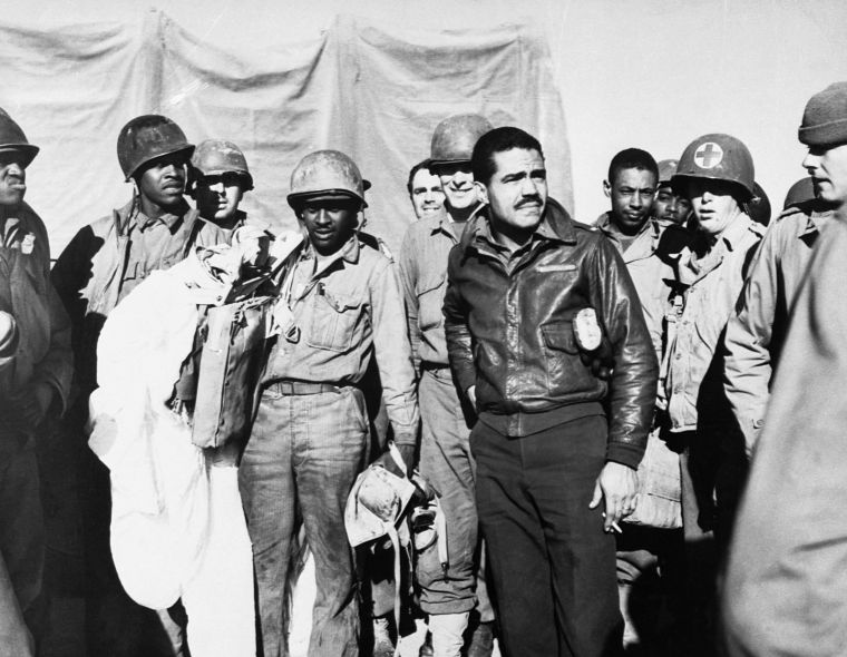 Members of the 99th Fighter Group of the Army Air Forces famous all-Negro outfit, pose for a picture at the Anzio beachh
