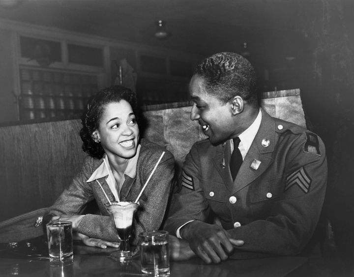 Wartime Couple Sharing a Soda
