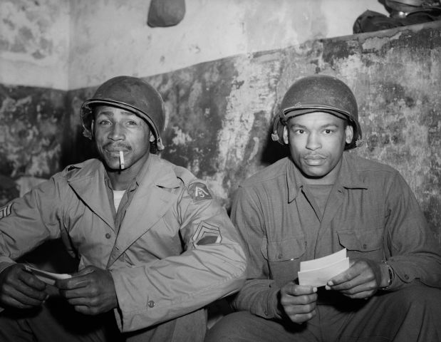 Soldiers Seated and Read Letters