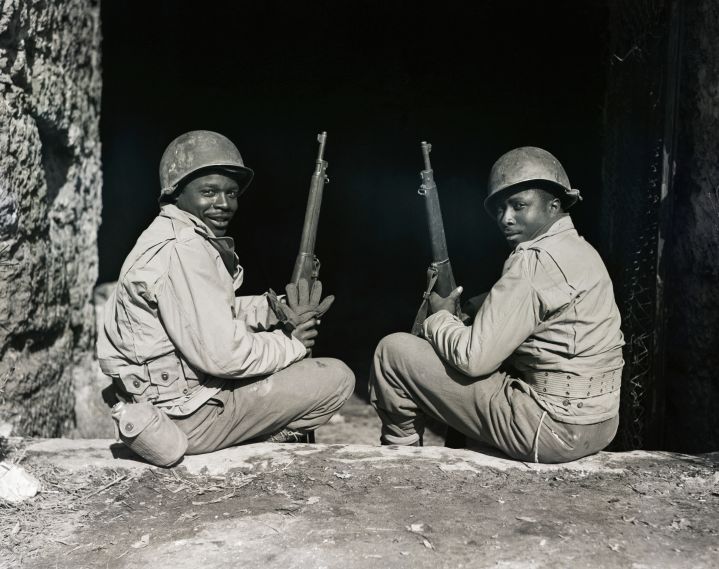 Two Black Soldiers Seated W/Rifles