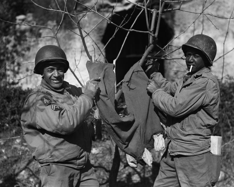 Two Soldiers Washing Clothes