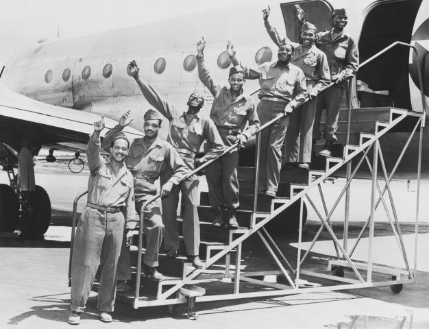 Tuskegee Airmen Waving on Gangway