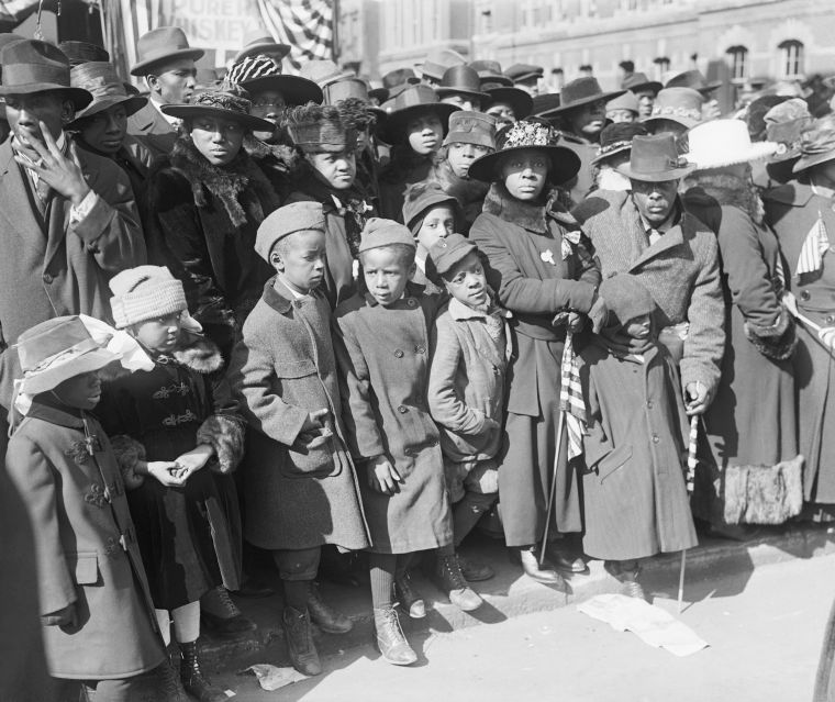 Group Watching Parade Of Black Infantry