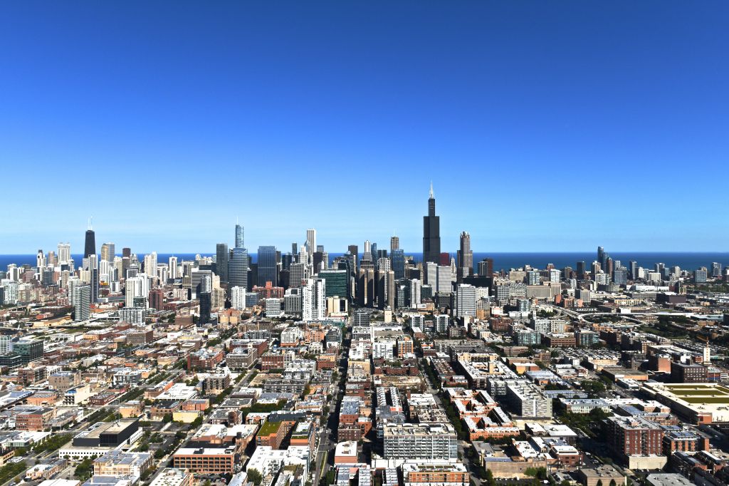 Aerial View Of Modern Buildings Against Blue Sky