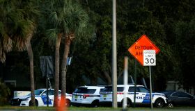 Orlando police officer shot; suspect has 4 children as hostages