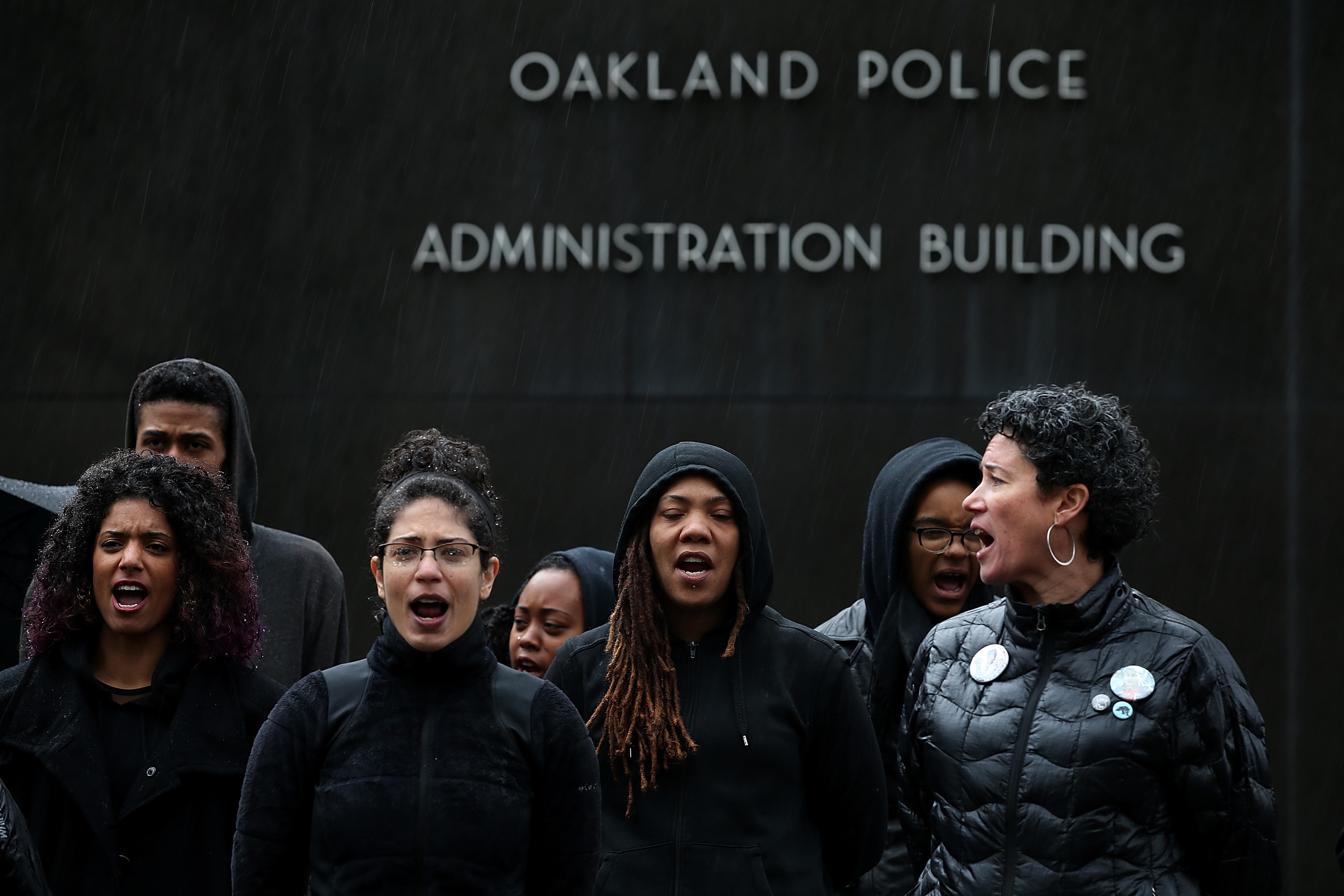 Protestors Chain Themselves To Oakland PD Headquarters