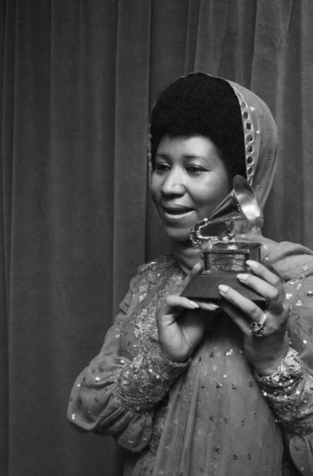 Aretha Franklin Holding Grammy