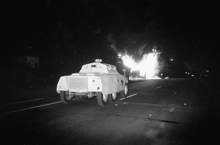 Police Truck Moving Toward Fire
