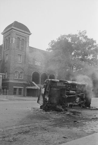 Bombed Car in Front of Church