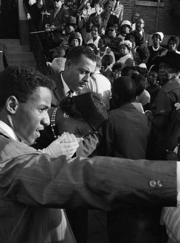 Bomb Victim's Mother Crying at Funeral Services