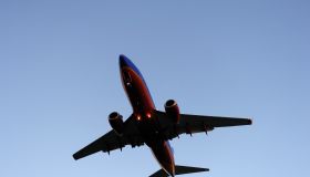 a Southwest Airlines Boeing 737-700 (LN2318) on final-approach after a pre-delivery test flight at dusk