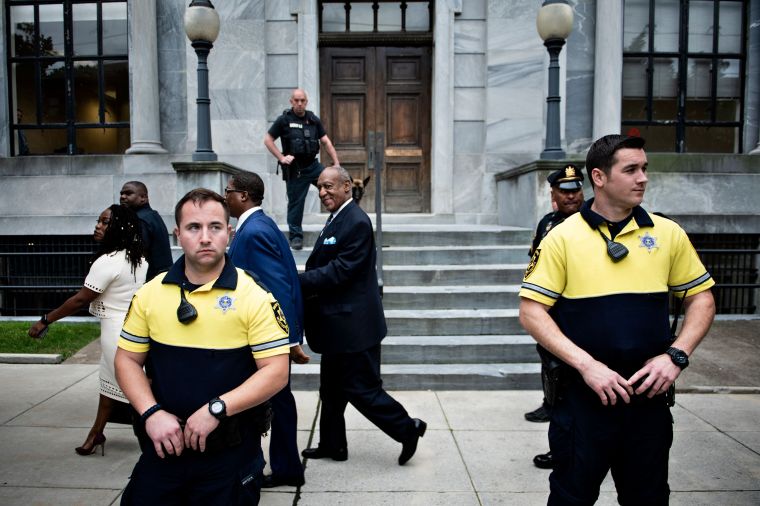 Bill Cosby leaves after the first day of sentencing hearing