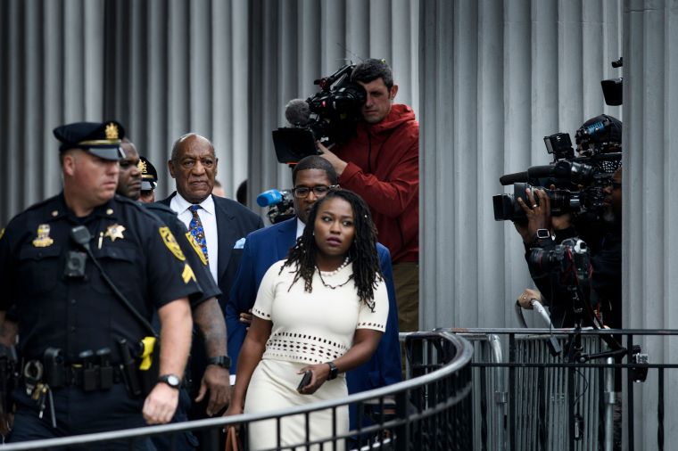 Bill Cosby leaves after the first day of sentencing hearing