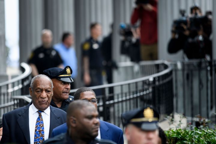 Bill Cosby leaves after the first day of sentencing hearing