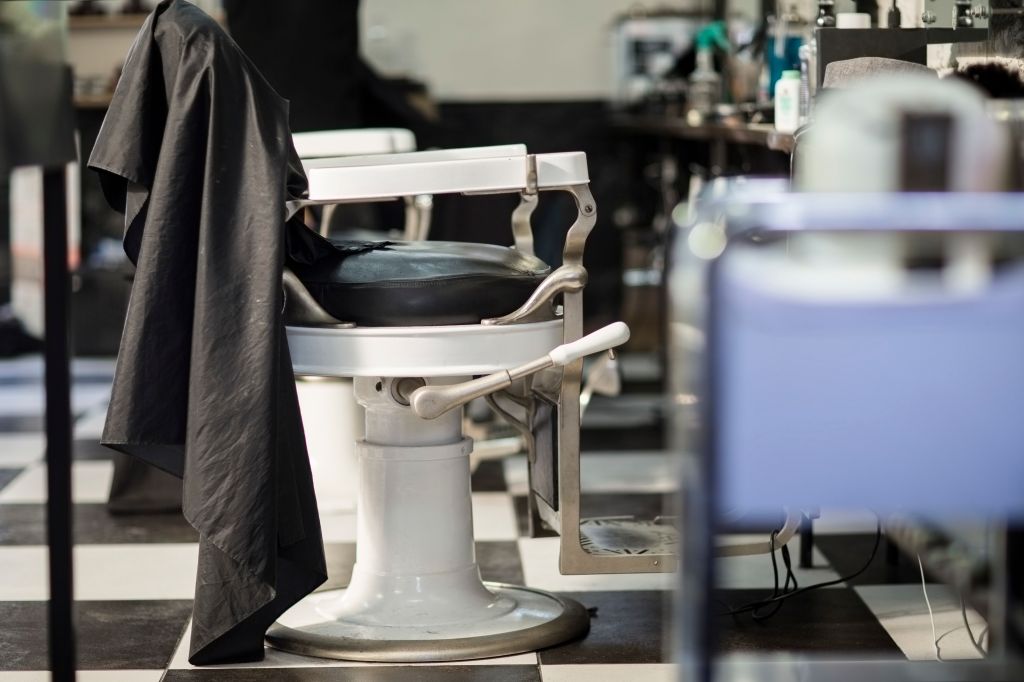Empty customers seat at barbershop