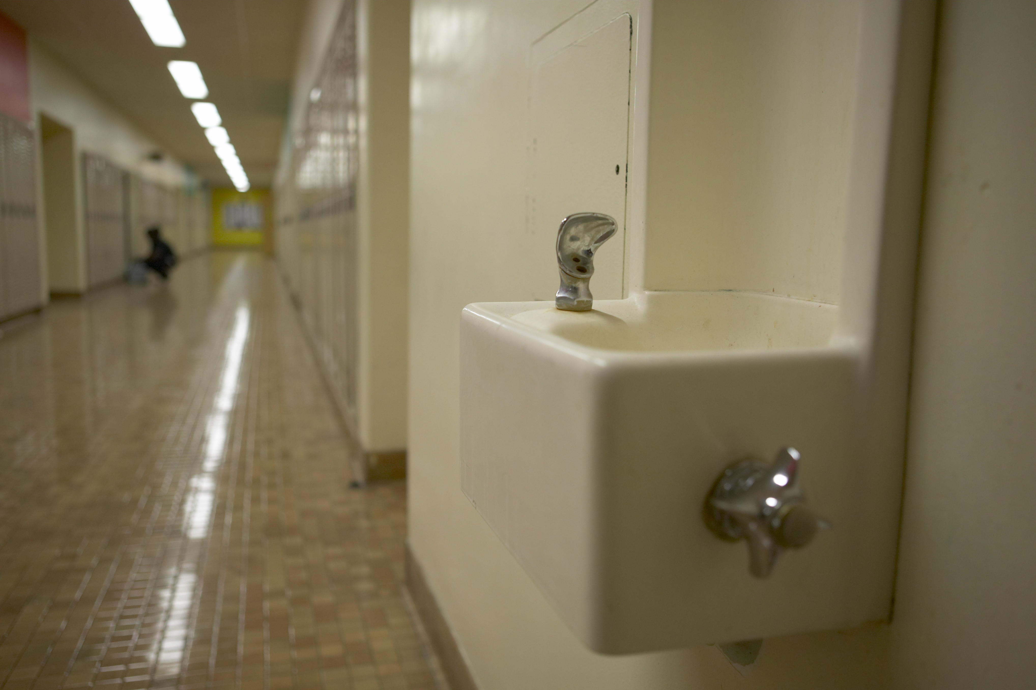 Drinking Fountain in School Hallway