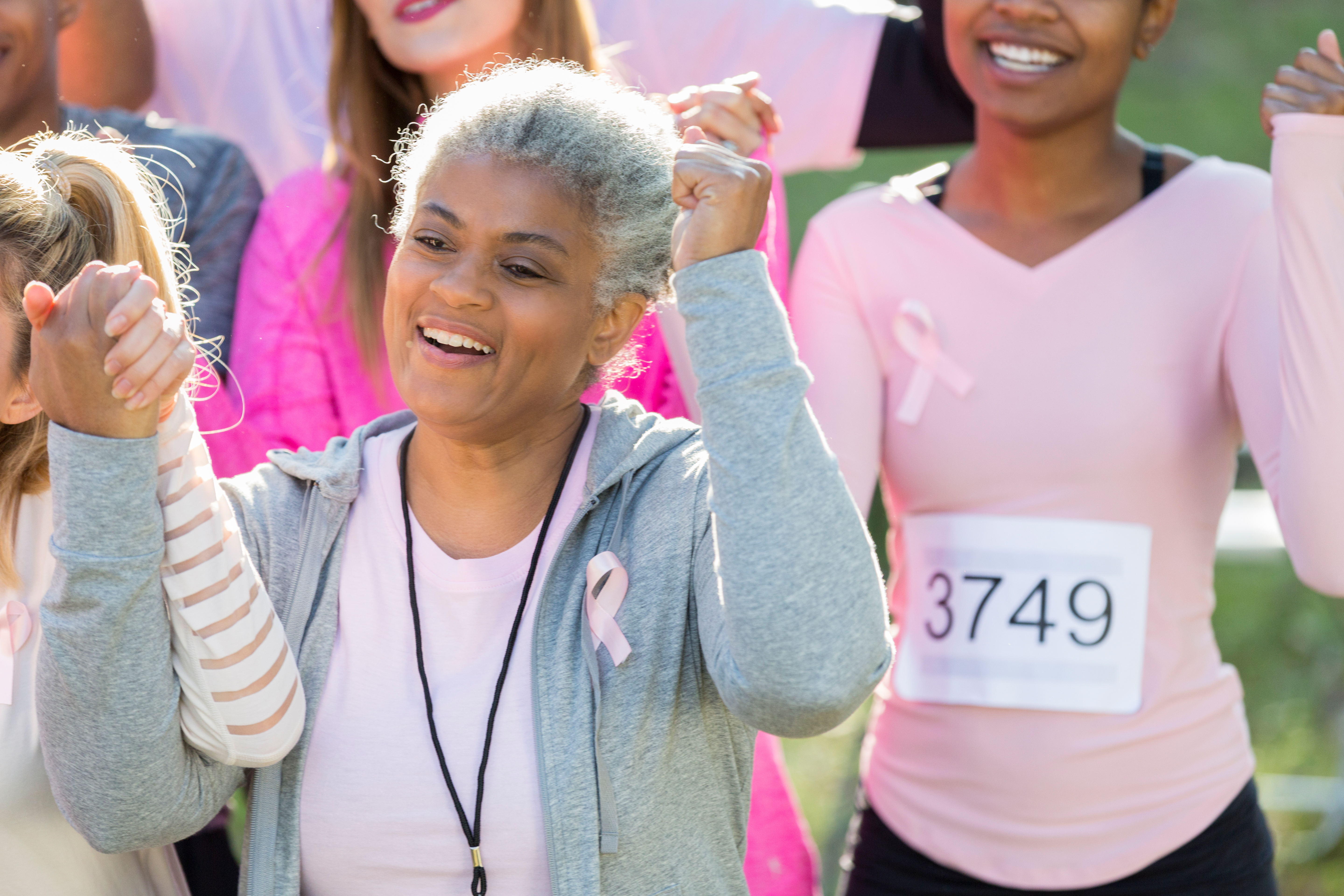 Senior breast cancer survivor during charity event