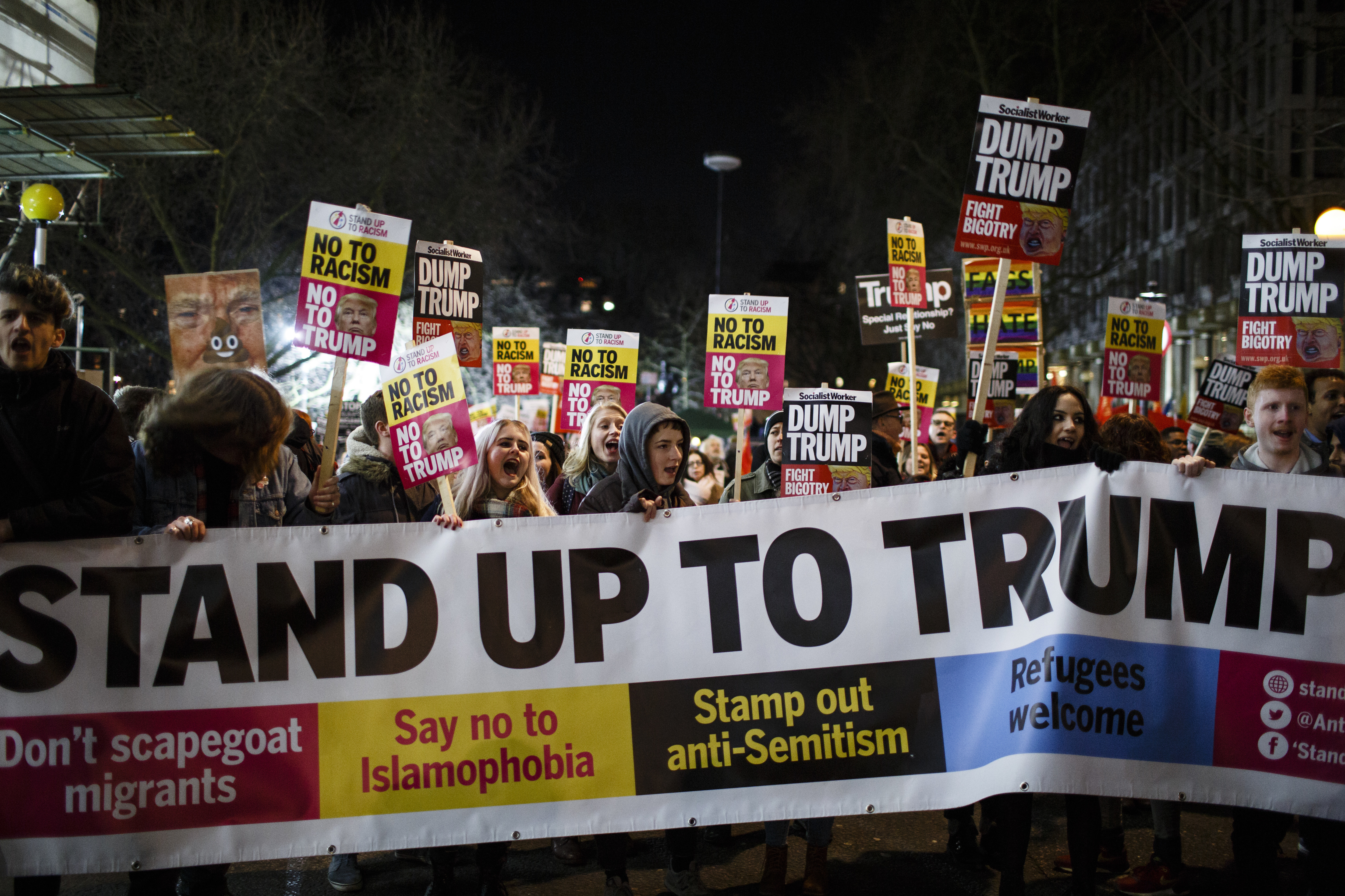 Demonstrators set off along North Audley Street following an...